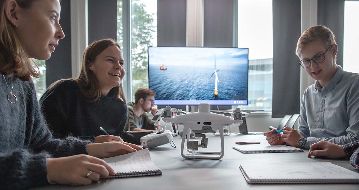 students working at a desk