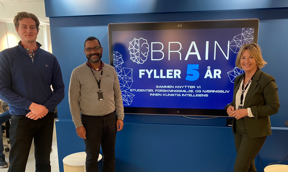 BRAIN leader Christian Lewin, NAIL leader Heri Ramampiaro and Dean Ingrid Schjølberg at the 5-year celebration at the AI-lab. 
