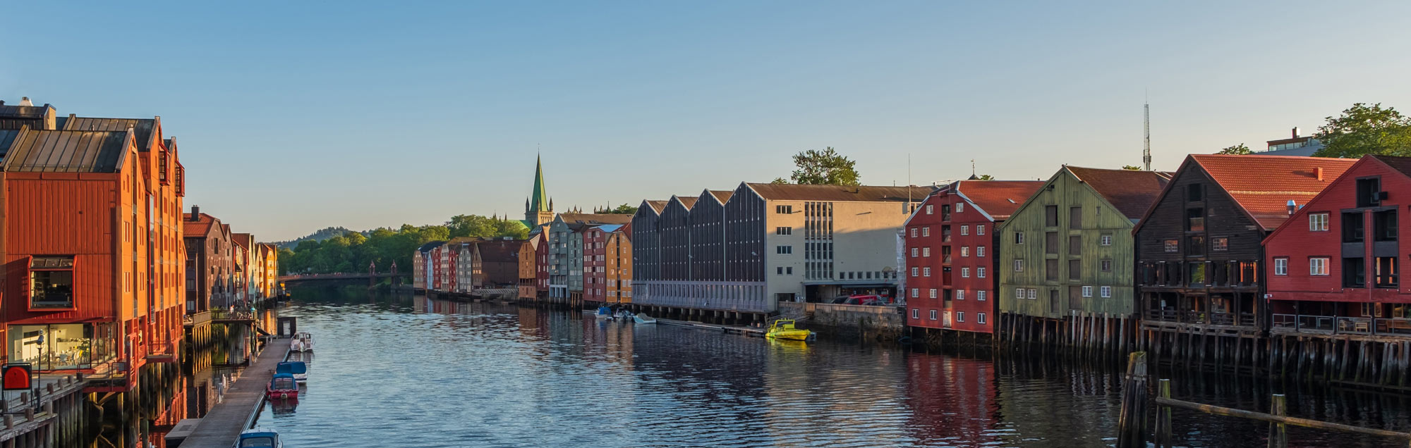 Wooden houses next to a river