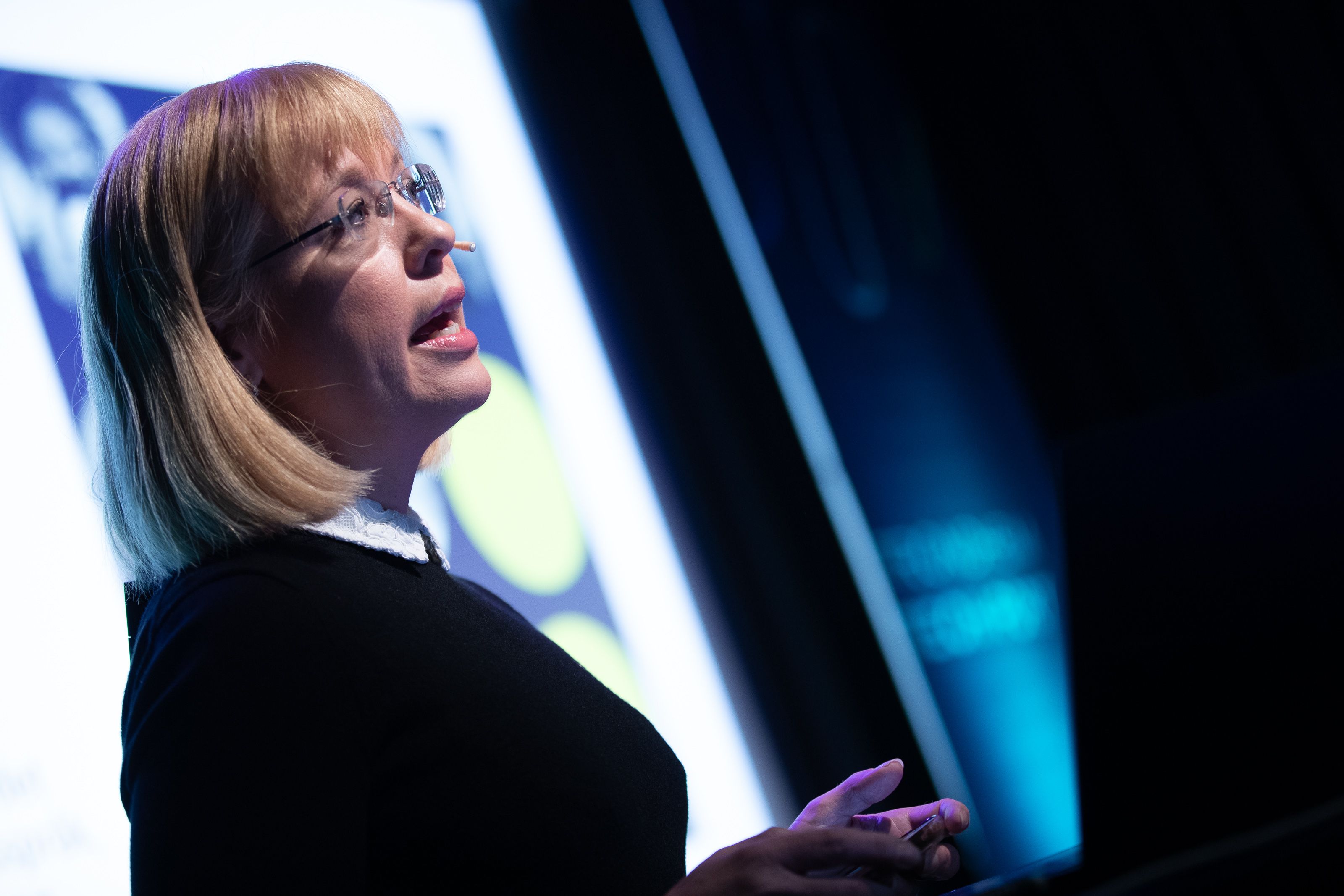 Åse Wetås speaking on stage