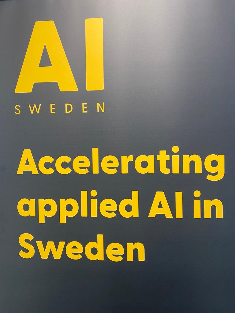 Sign reading "Accelerating applied AI inSweden"