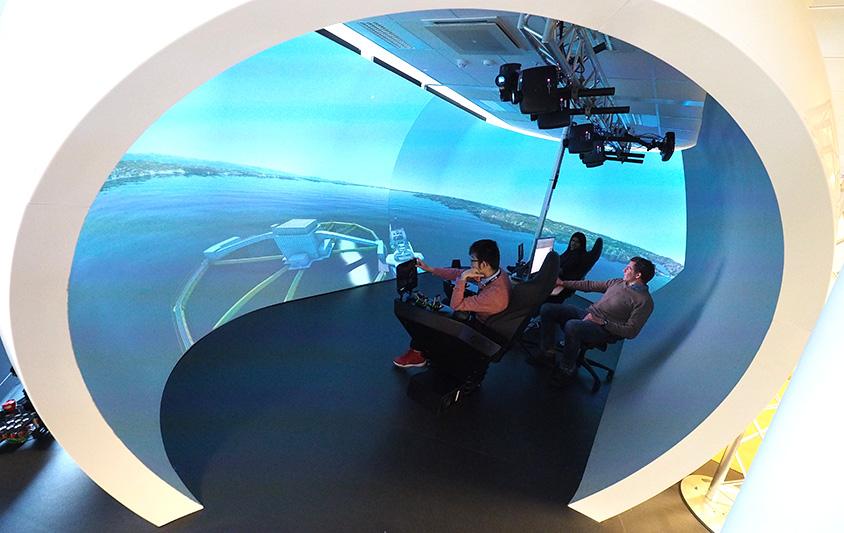 Researchers in a simulation room. Photo