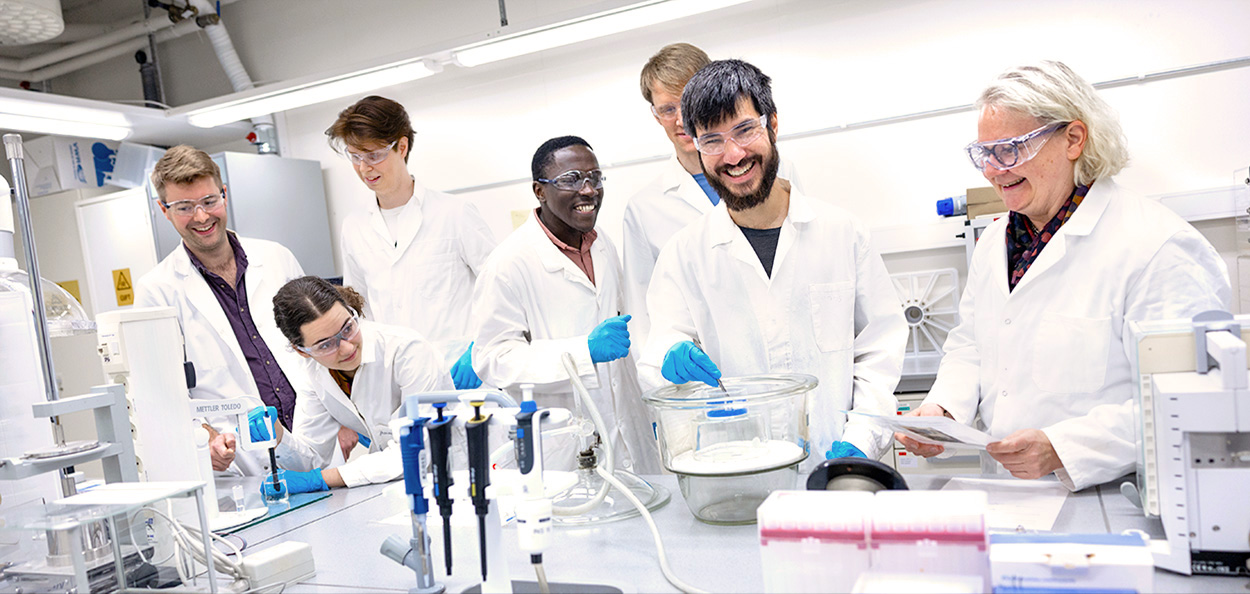 Happy researchers in a lab