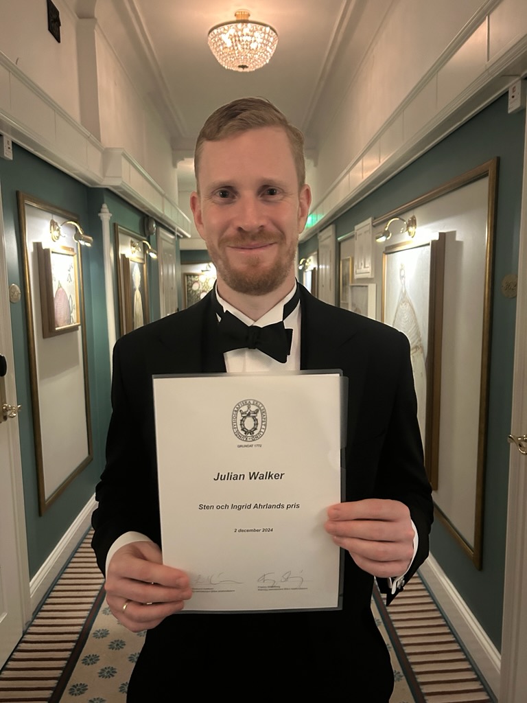 man with diploma