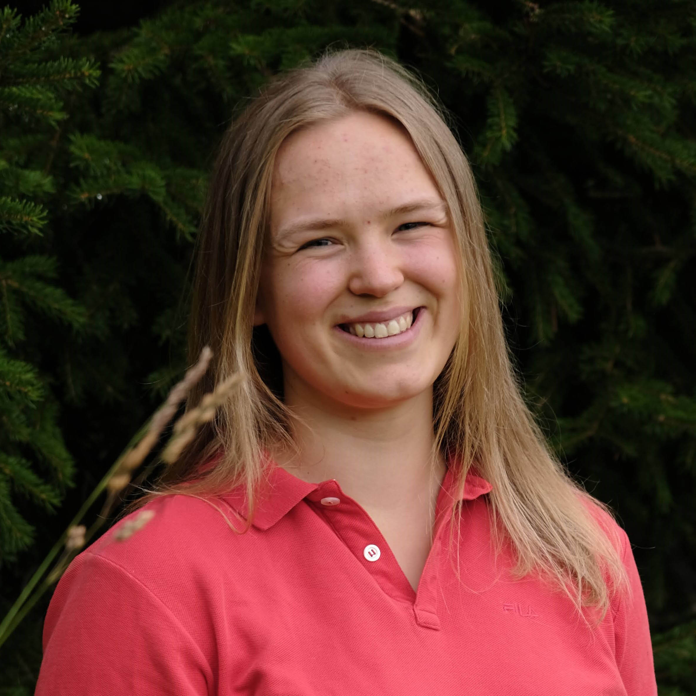 smiling woman with green background