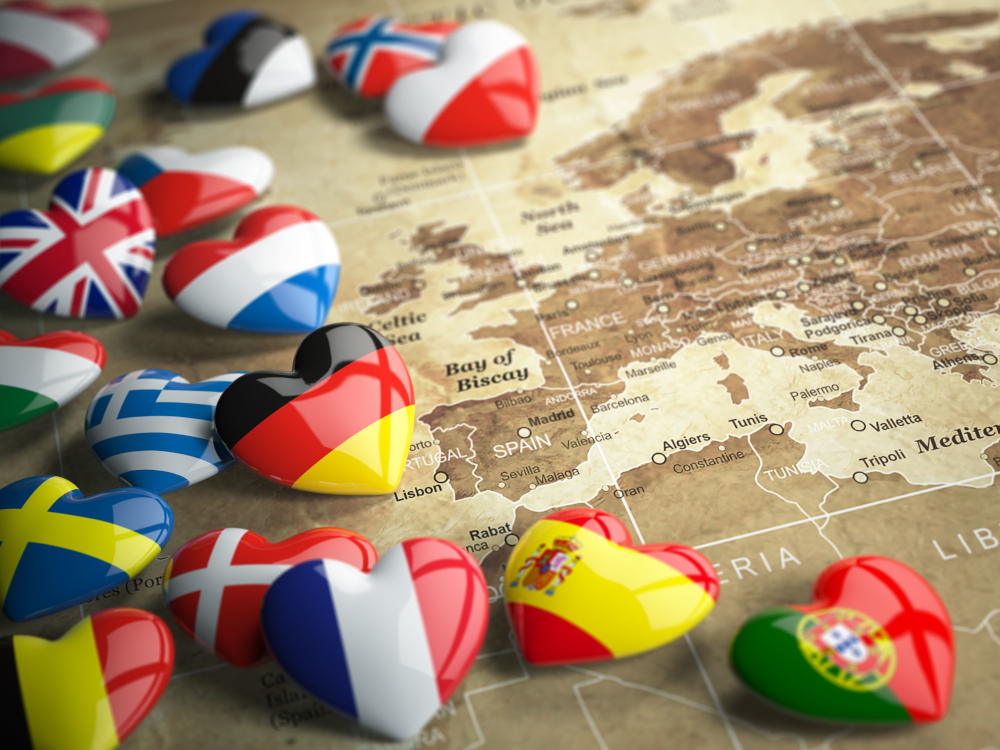 A map covered with flags in the shape of hearts.