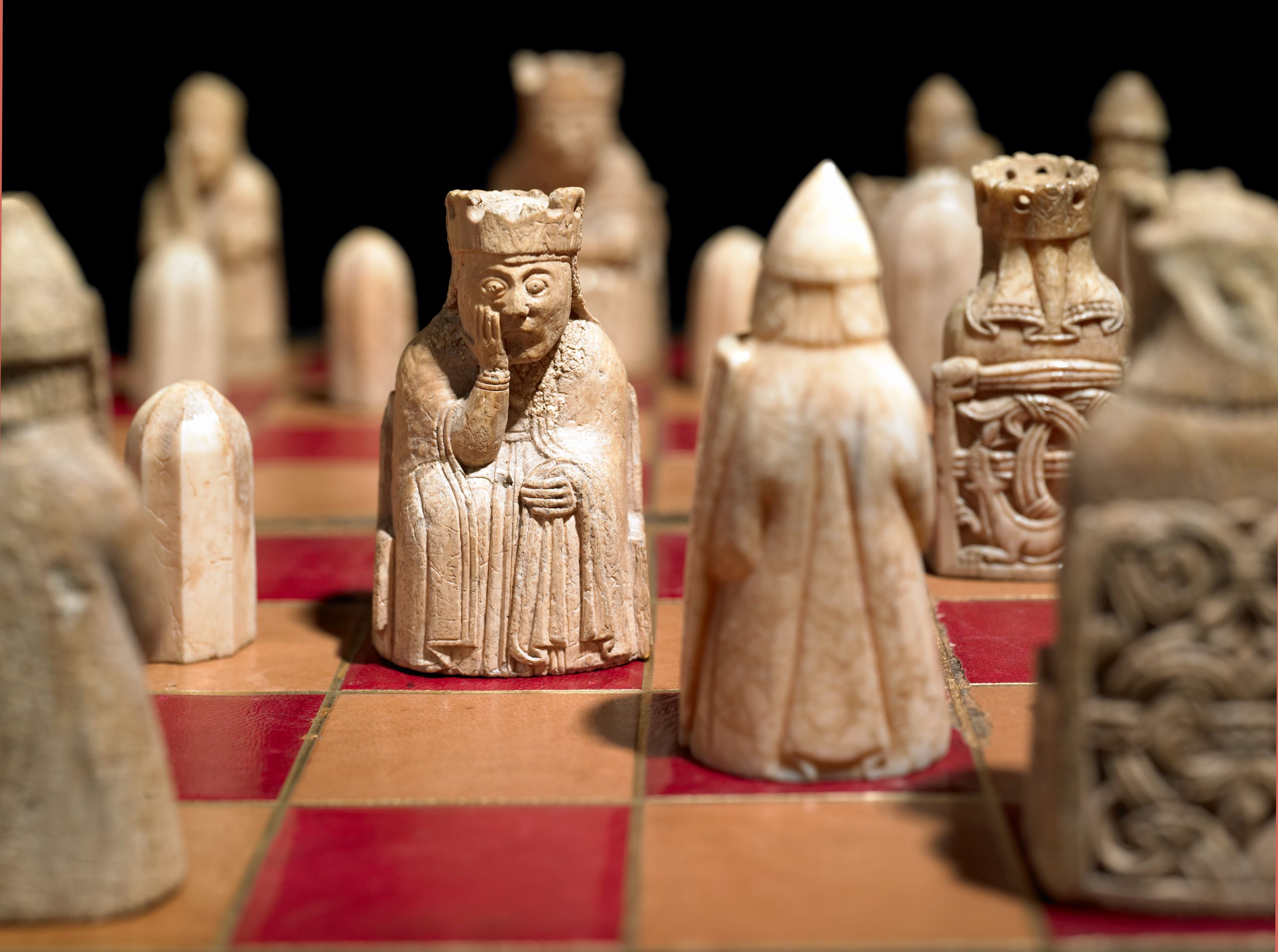 Queen on a check board