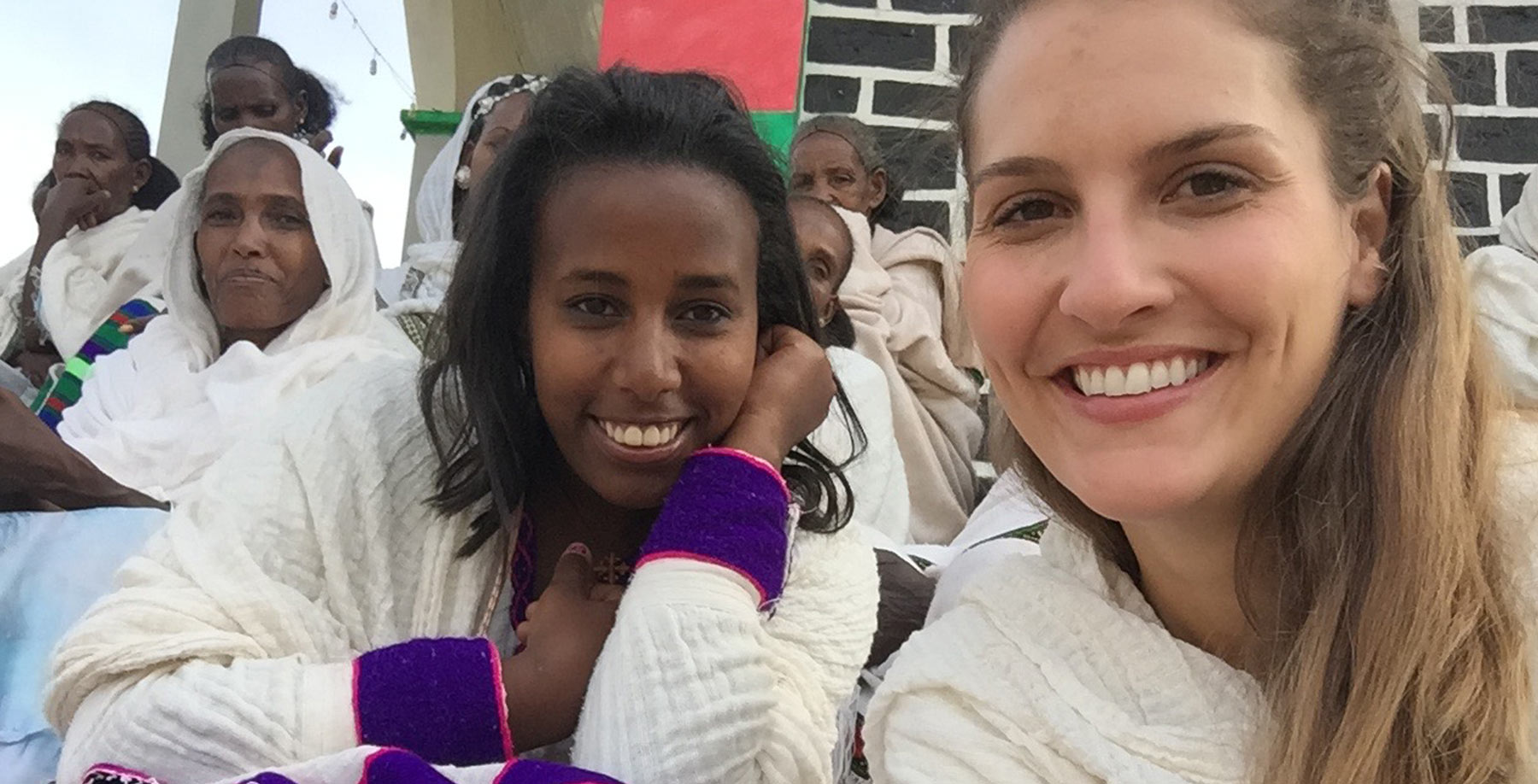 Picture of African women gahtering in white clothes